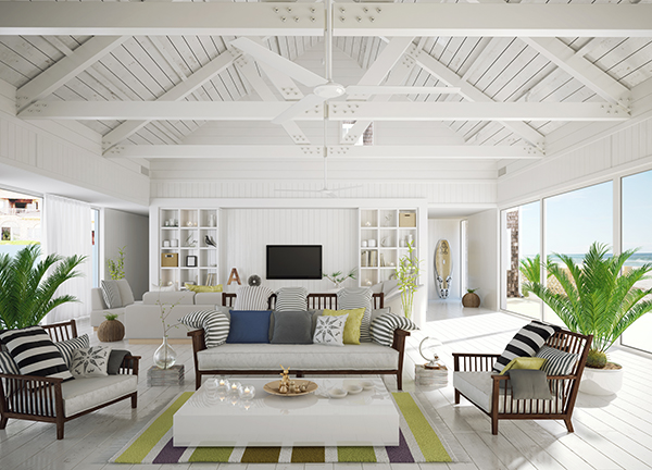Beach house with modern layout and white shiplap walls with large sliding doors letting light in on either side