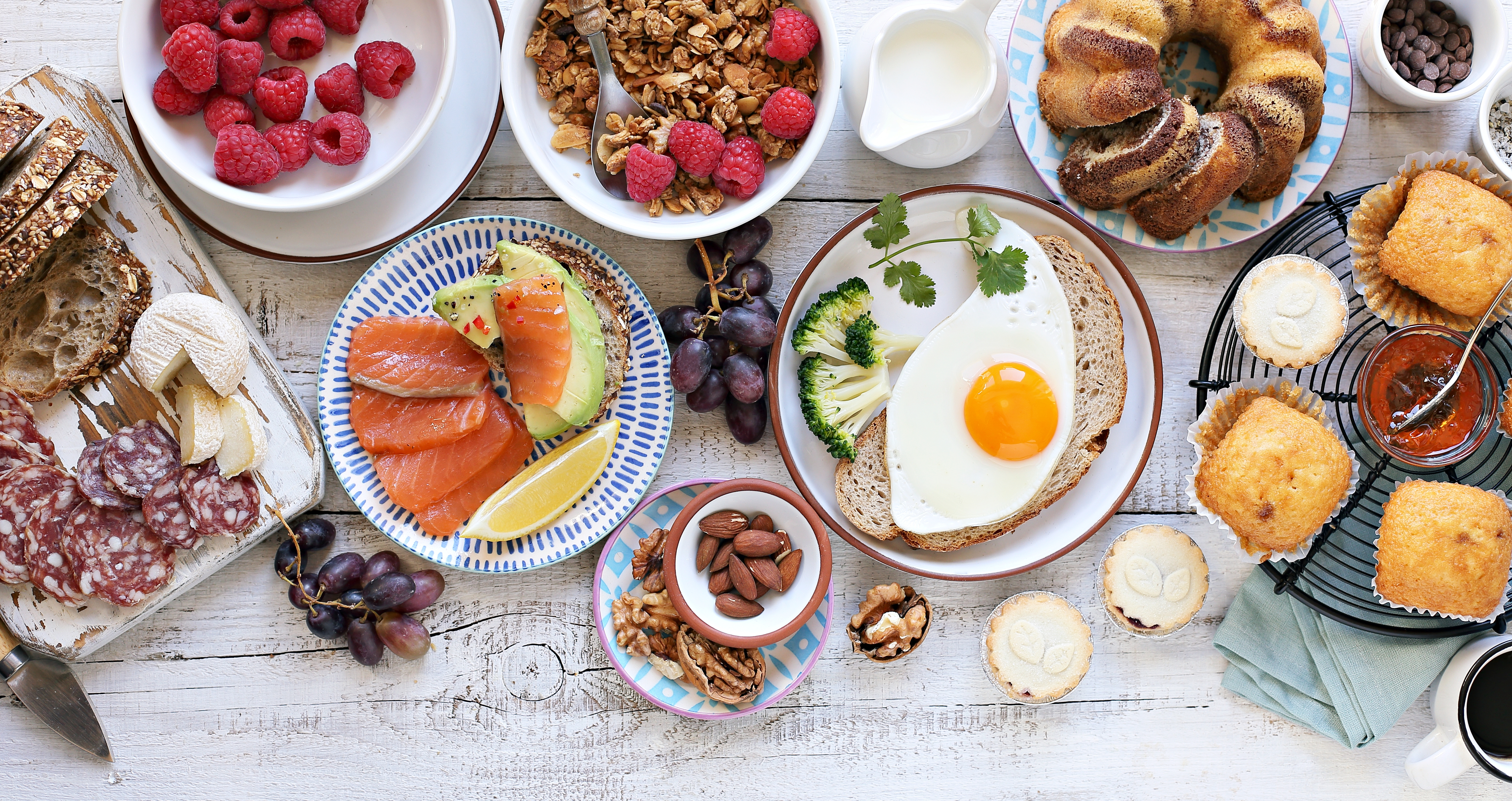 variety of brunch food on picnic table