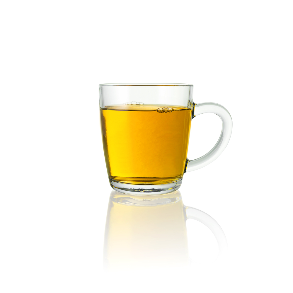 warm tequila drink in a glass mug