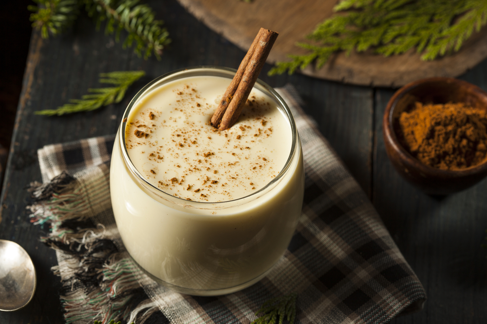 eggnog with a cinnamon stick