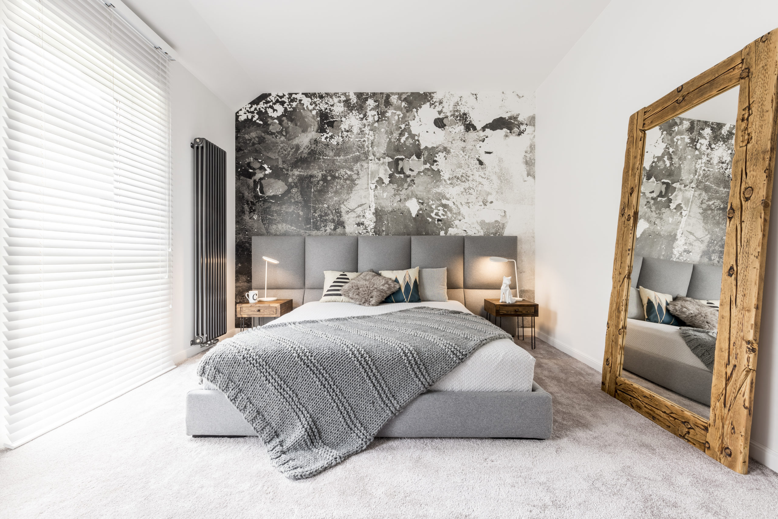 bedroom with huge leaning mirror